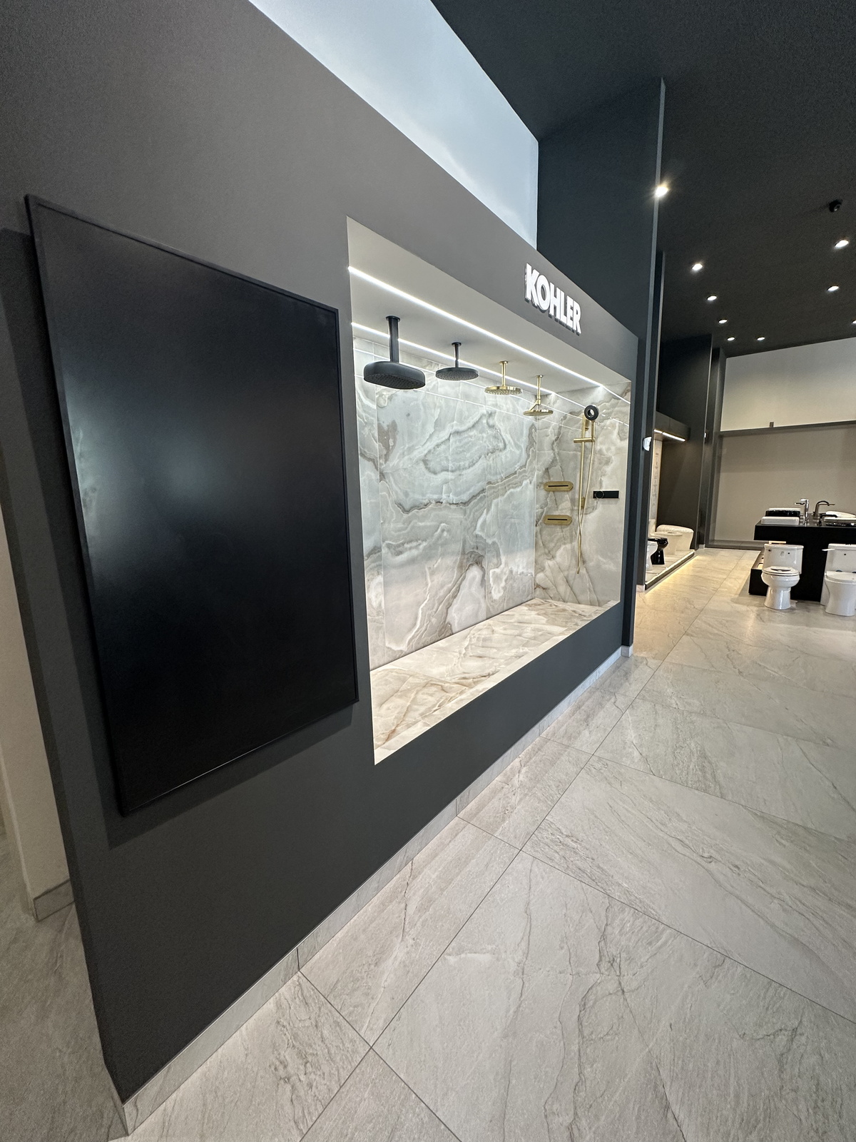 Premium Kohler fittings mounted on shower column